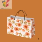 Premium floral paper carry bag for retail and event gifts
