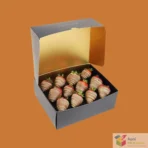 Luxury rigid dessert packaging box open lid showing neatly arranged sweets
