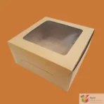 Window cake box showing chocolate cake inside