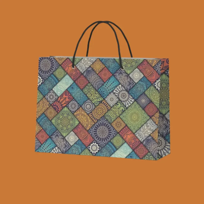 Colorful printed paper shopping bag with black rope handles