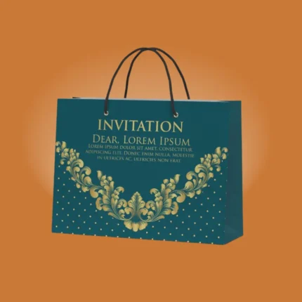 Teal and gold printed paper shopping bag with rope handles